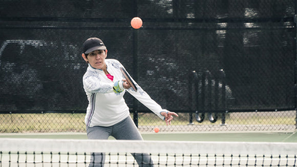 On-court Engage Pro Player with her favorite Engage Pickleball paddle